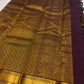 Mayil Chakram zari motif detail on the deep aubergine Kanchipuram saree