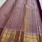 Close-up of Mayil Kamalam antique gold zari Butta on KanchiPattu saree