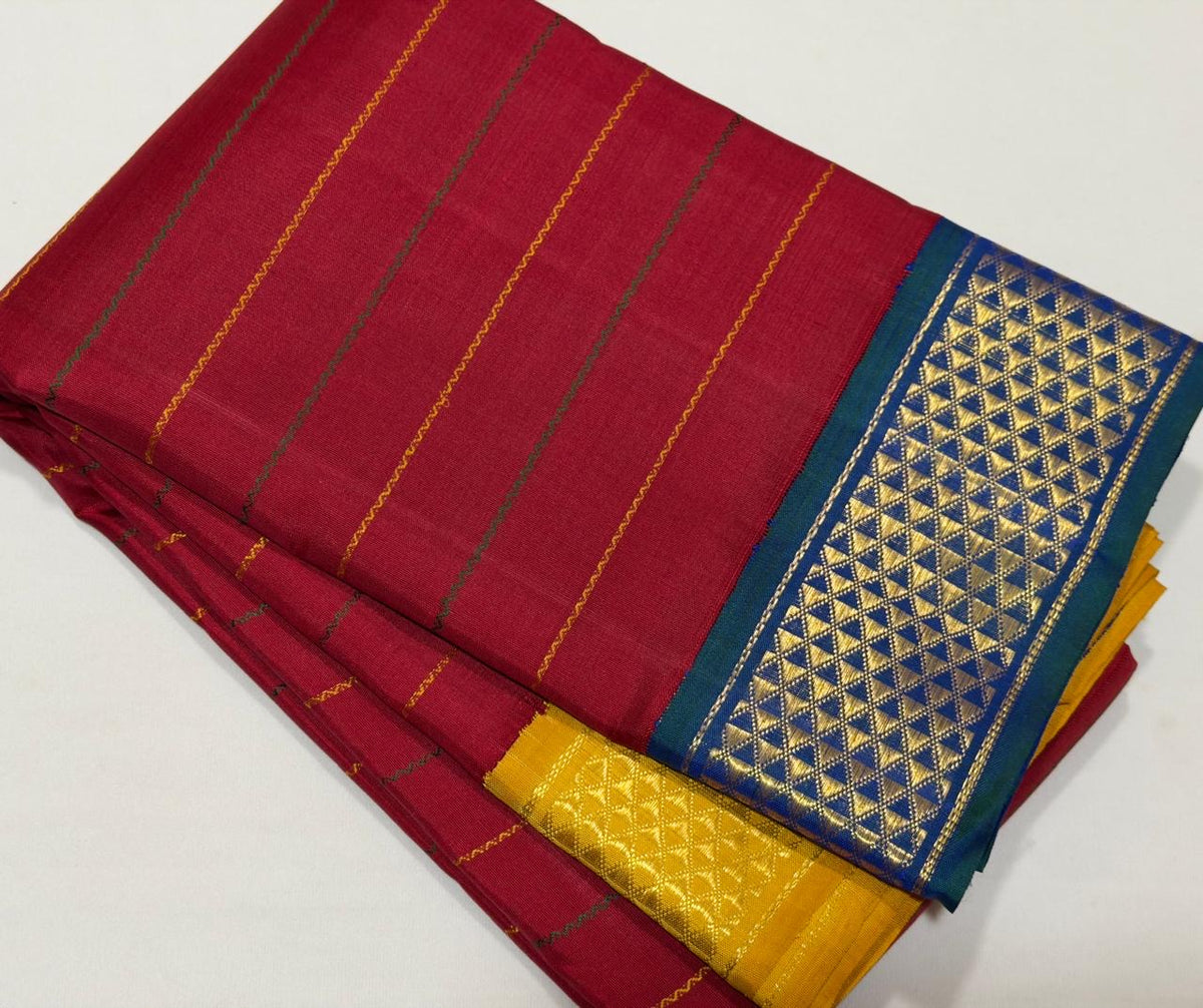 Peacock blue Korvai border with gold zari Mayil Kann ornamentation