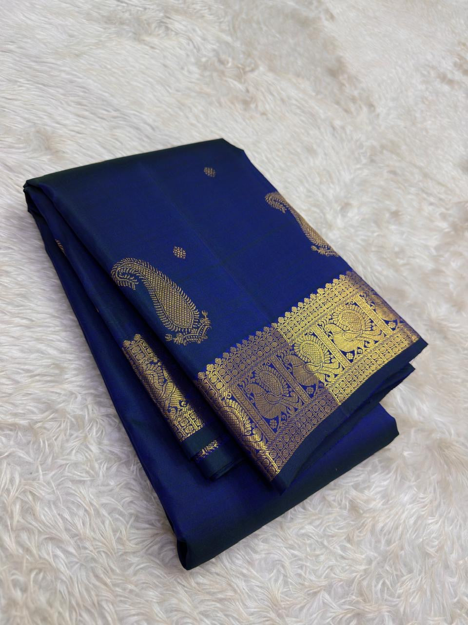 Mayil Kazhuthu blue-green pure silk Kanchipuram Butta saree with handwoven zari paisley buttas