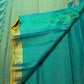 Peacock blue-green handwoven Kanchi Pattu Vairaoosi saree with large traditional bird zari motifs.