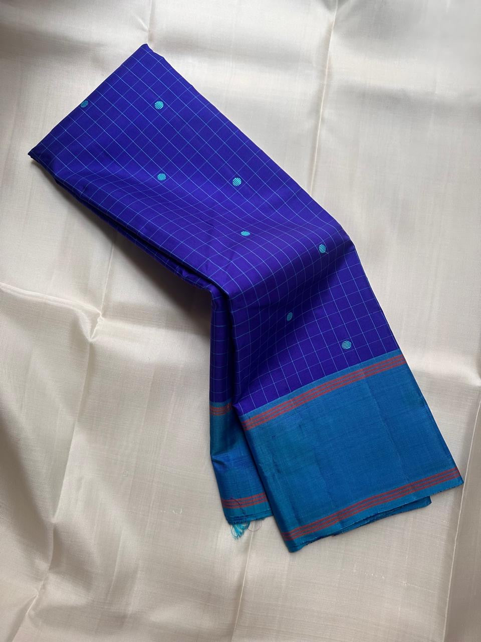 Mayil Kazhuthu border with Arakku red lines, royal-blue Kanjipuram Rettapet saree