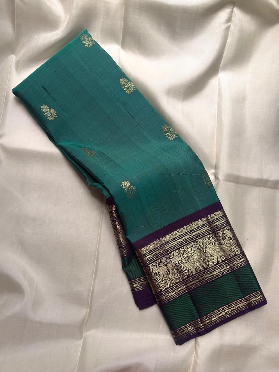 Royal Purple Kanjivaram border with grand antique gold zari Yanai designs