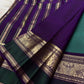 Handwoven blue-green Kanchipuram silk saree with antique gold zari buttas