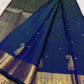 Peacock blue-green Kanchipuram silk saree with petite gold buttas and intricate Mayil zari border