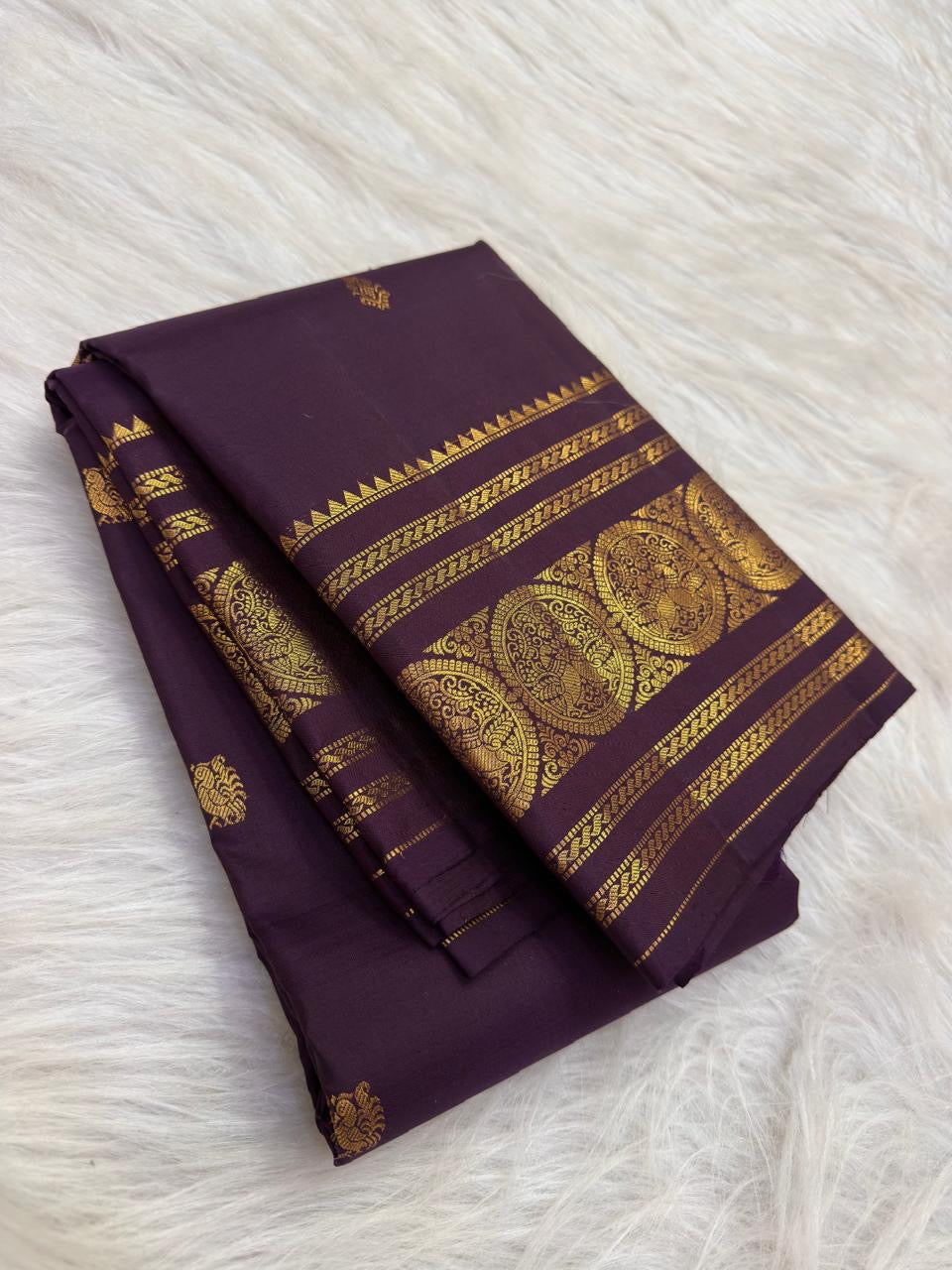 Dusky Aubergine Handwoven Pure Silk Kancheepuram Saree with Mayil Zari Buttas and Antique Pon Zari Border
