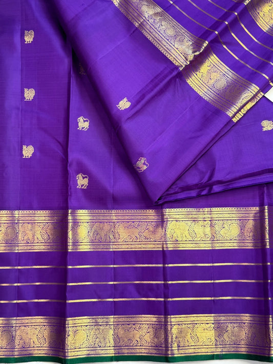 Mayil and Yazhi procession pallu on Royal Purple Kancheepuram silk saree - Idam Living