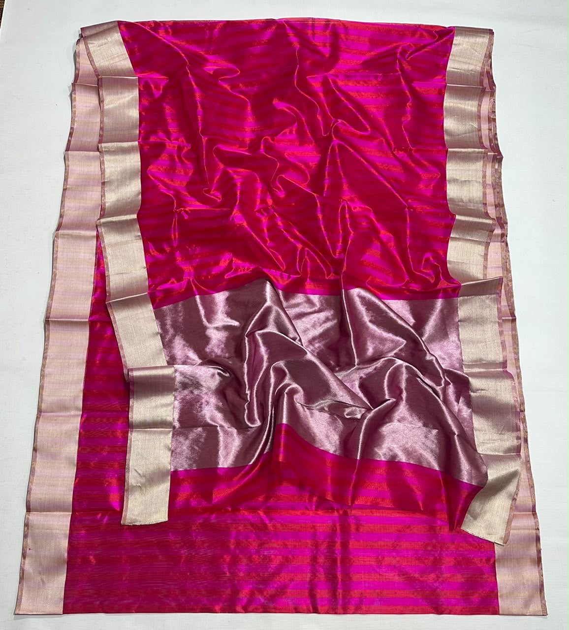 Pale metallic border on pink Chanderi saree