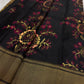 Black Kanchipuram silk saree with raspberry rose olive and antique-gold handwoven floral motifs.