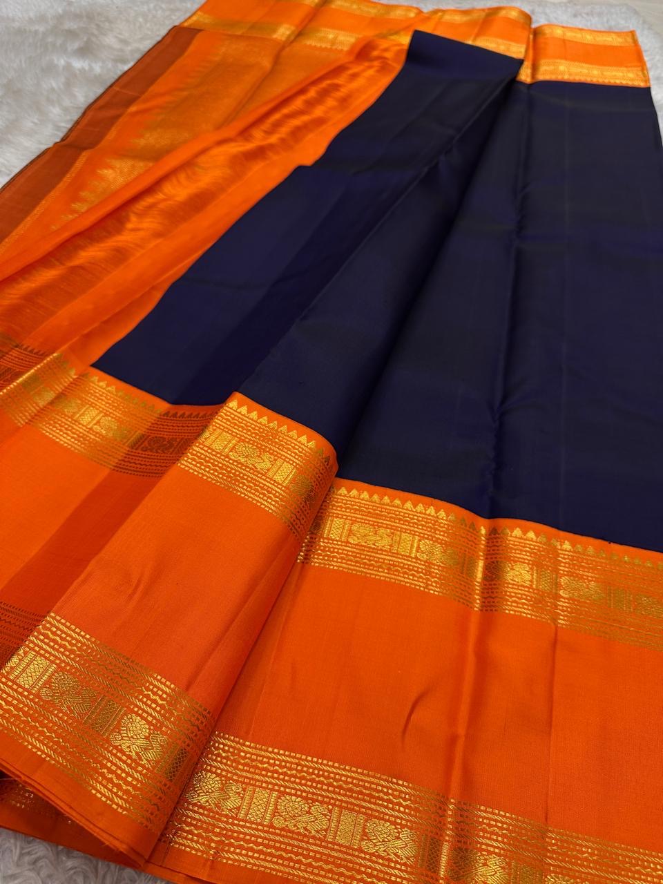 Midnight Blue Handwoven Pure Silk Kancheepuram Saree with Vivid Orange Rettapet Zari Border
