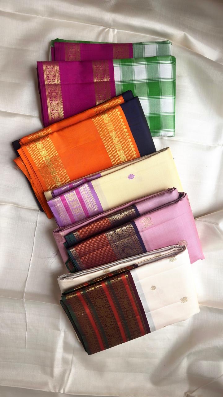 Midnight Blue Handwoven Pure Silk Kancheepuram Saree with Vivid Orange Rettapet Zari Border