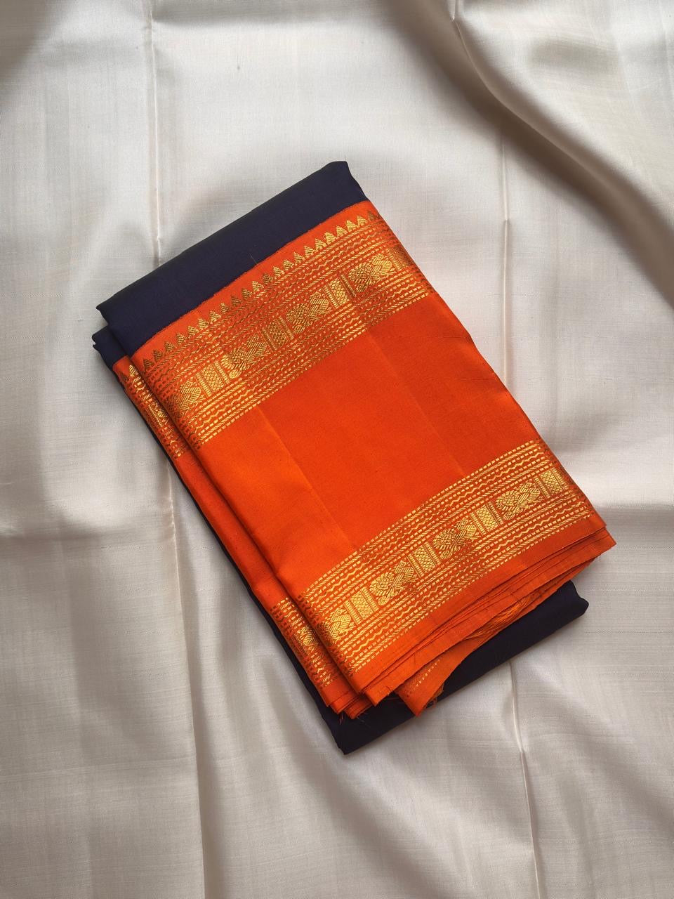 Midnight Blue Handwoven Pure Silk Kancheepuram Saree with Vivid Orange Rettapet Zari Border
