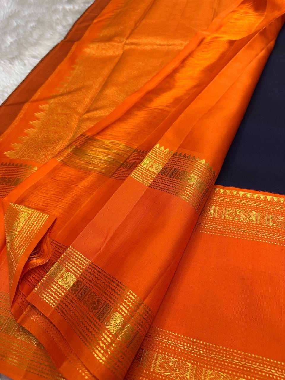 Midnight Blue Handwoven Pure Silk Kancheepuram Saree with Vivid Orange Rettapet Zari Border