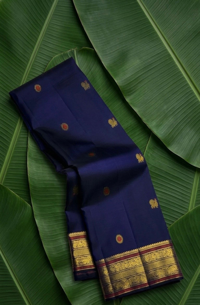 Midnight navy and bottle green butta Kanjipuram silk saree with meenakari butta and copper zari tanpura pallu — Idam Living