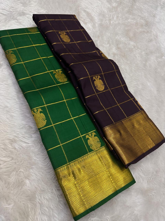 Deep Kanchana Kanchipuram silk saree with midnight-purple undertones, zari kattam checks, and Gandaberunda motif weaving