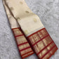 Milk White and Arakku Red Handwoven Pure Silk Kancheepuram Saree with Mayil Chakram Zari Butta and Varisaipet Border