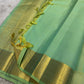 Aqua Mint and Pale Gold Kanchipuram silk Kattam saree.