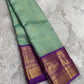Pastel Mint Green and Royal Orchid Purple Handwoven Pure Silk Kanchipuram Saree with Vairaoosi Korvai Border and Mayil Chakram Butta