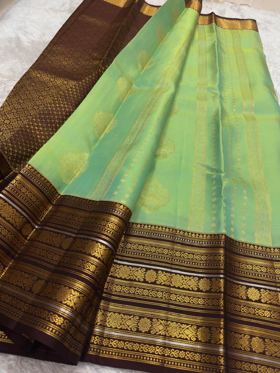 Deep maroon korvai vanasringaram border on mint green Kanchipuram pure silk saree — Idam Living