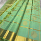 Aqua Mint Pure Silk Kanchipuram spacious Zari Kattam grid.