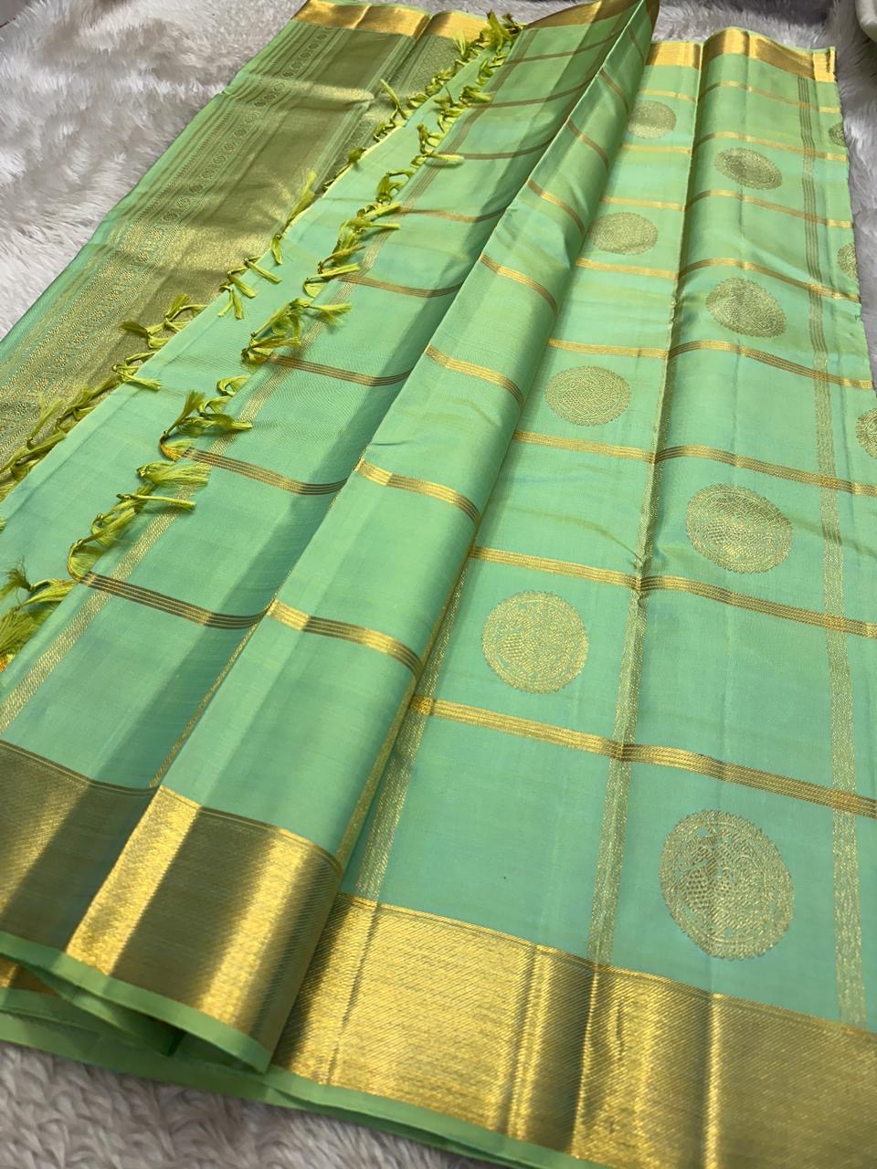 Aqua Mint Pure Silk Kanchipuram spacious Zari Kattam grid.