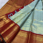 Misty Aqua Blue and Brick Red Handwoven Pure Silk Kanjivaram Saree with Peacock Butta and Korvai Border