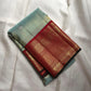 Misty Aqua Blue and Brick Red Handwoven Pure Silk Kanjivaram Saree with Peacock Butta and Korvai Border