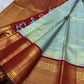Misty Aqua Blue and Brick Red Handwoven Pure Silk Kanjivaram Saree with Peacock Butta and Korvai Border