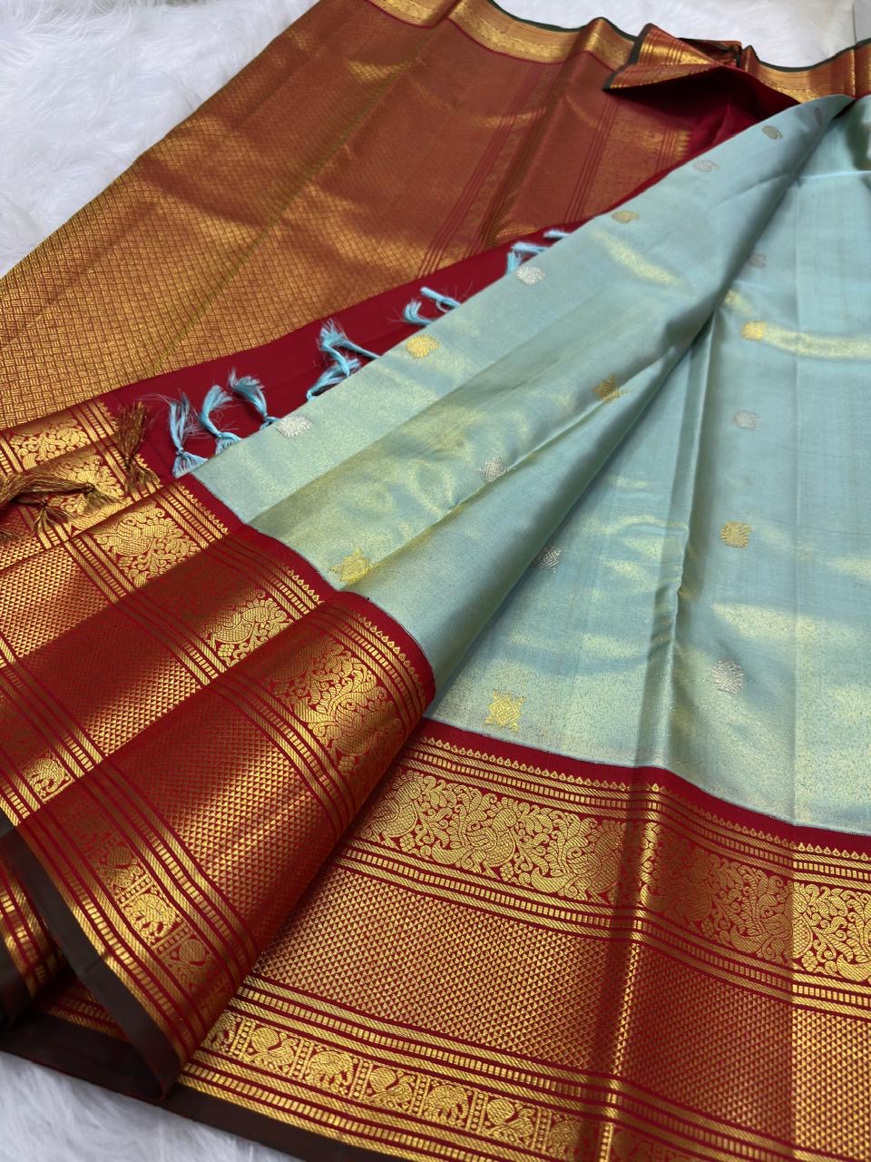 Misty Aqua Blue and Brick Red Handwoven Pure Silk Kanjivaram Saree with Peacock Butta and Korvai Border