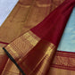 Misty Aqua Blue and Brick Red Handwoven Pure Silk Kanjivaram Saree with Peacock Butta and Korvai Border