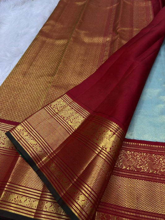Misty Aqua Blue and Brick Red Handwoven Pure Silk Kanjivaram Saree with Peacock Butta and Korvai Border