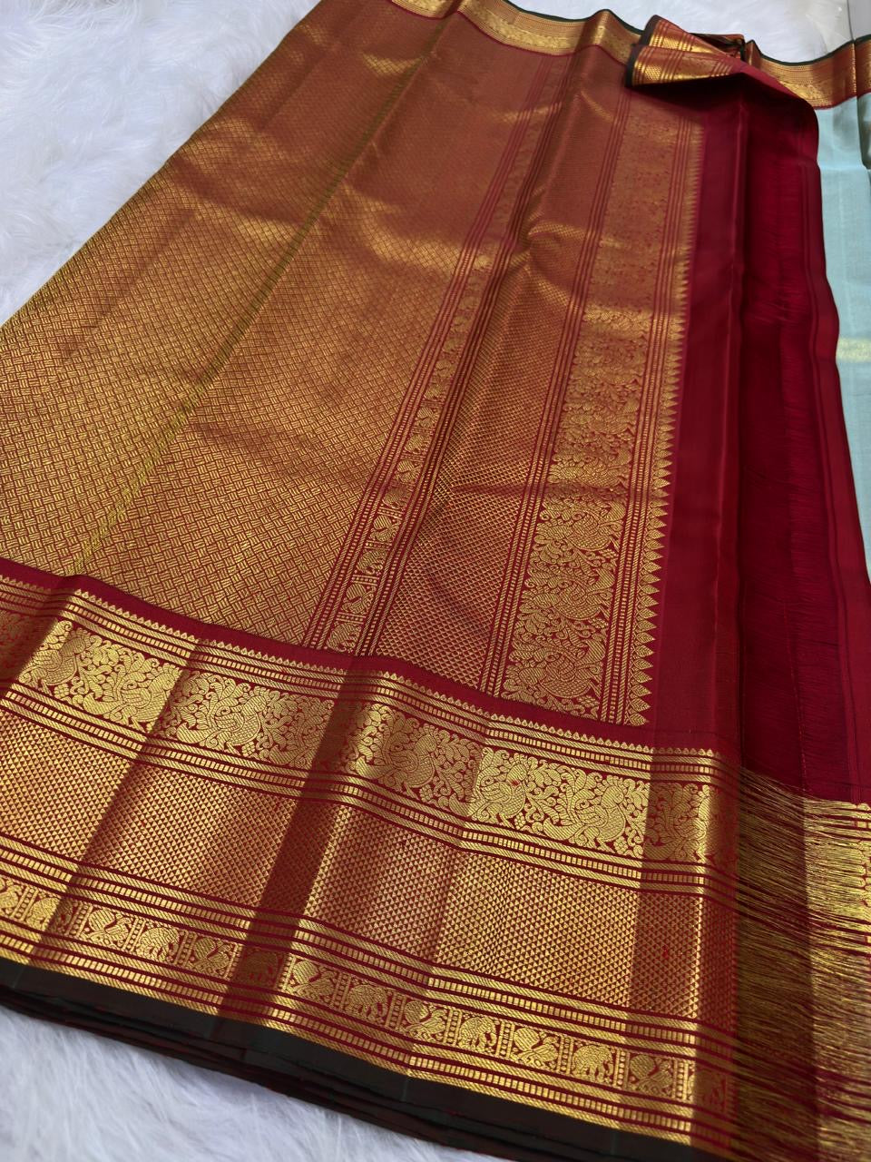 Misty Aqua Blue and Brick Red Handwoven Pure Silk Kanjivaram Saree with Peacock Butta and Korvai Border