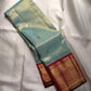 Misty Aqua Blue and Brick Red Handwoven Pure Silk Kanjivaram Saree with Peacock Butta and Korvai Border