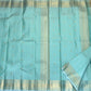 Misty Aqua Blue Kanjeevaram silk saree, gold zari butta motif close-up — Idam Living