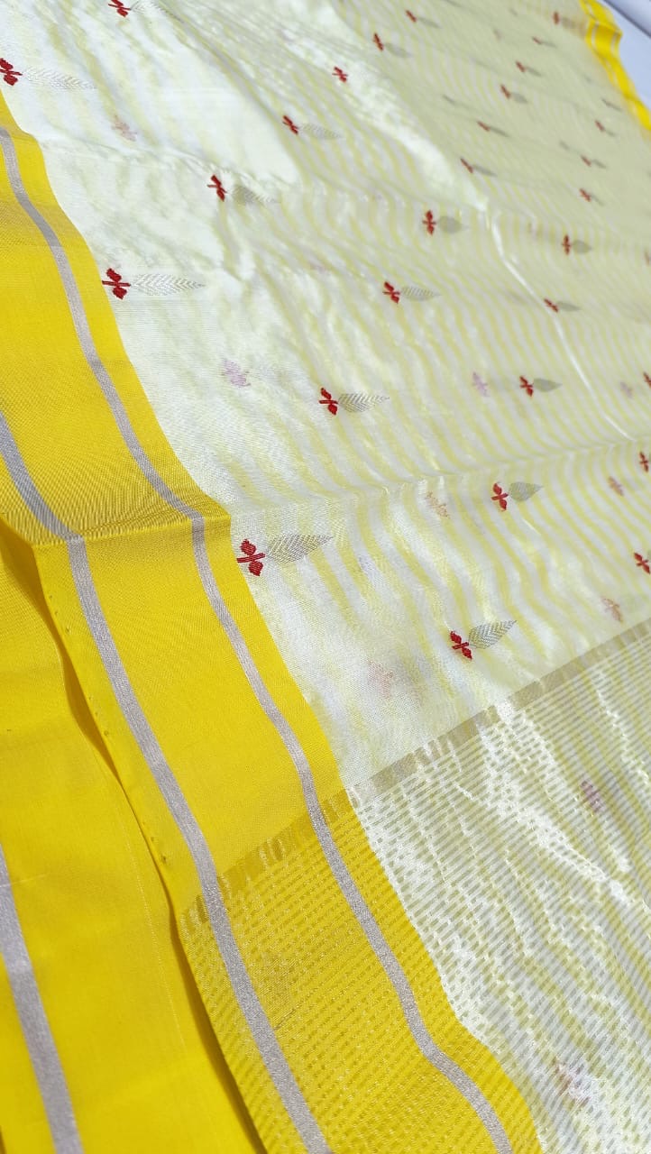 Ivory and yellow Chanderi handloom saree showing fine silver-grey border stripes and coordinating running blouse fabric.