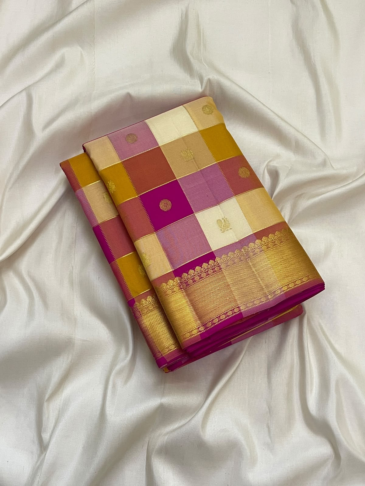 Rani Pink and antique-gold zari border on multicolour Paalum Pazhamum pure silk saree.