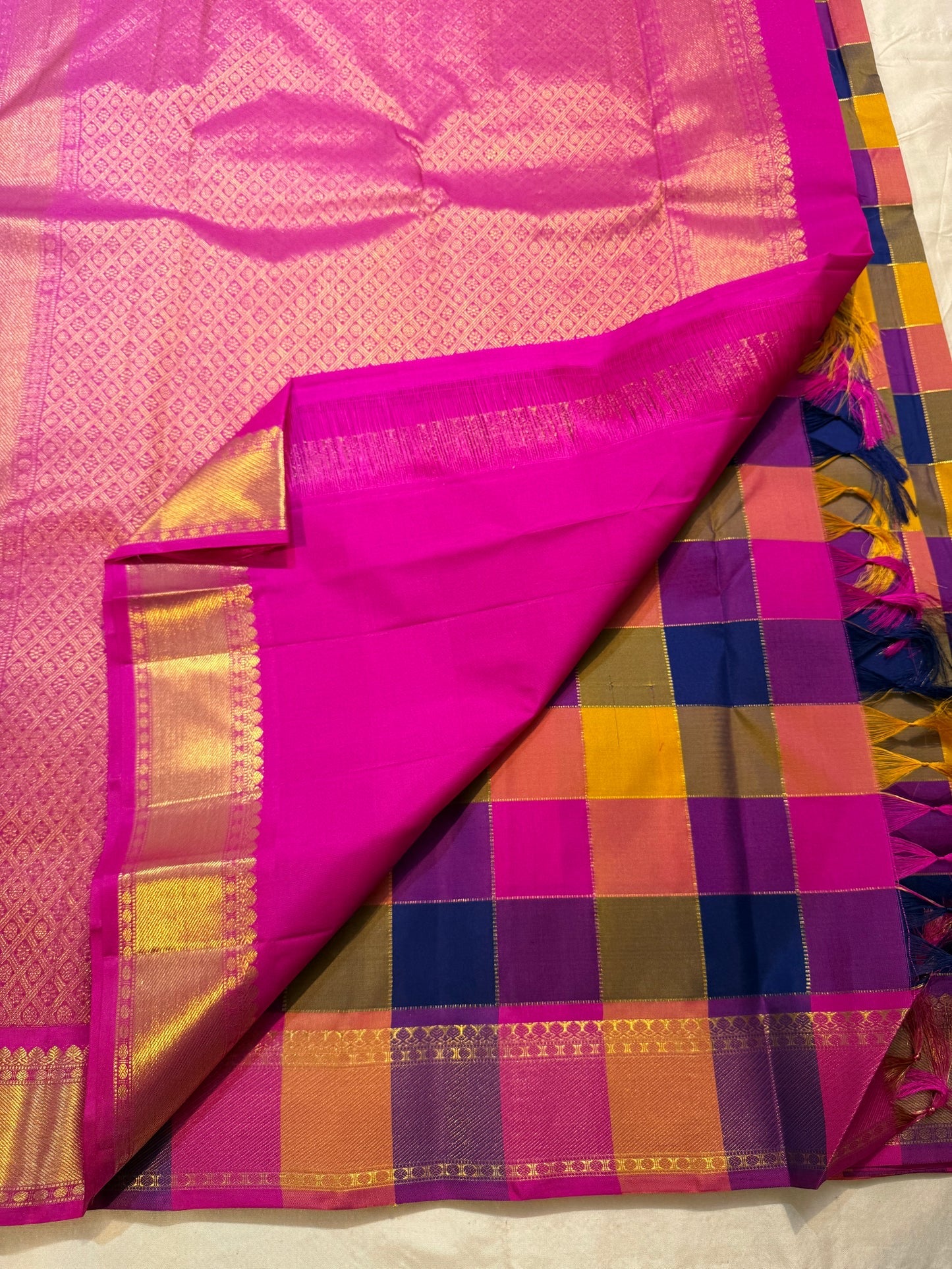 Folded view of multicolour paalum pazhamum Kancheepuram silk saree with magenta border — Idam Living