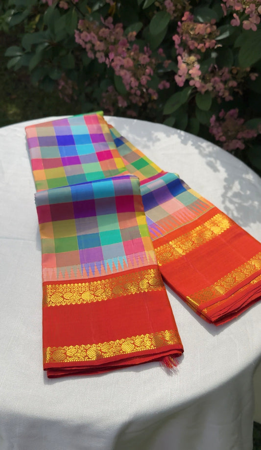 Multicolour Kancheepuram pure silk saree in Kanchi Kattam checks with kumkumam red Rettapet border and gold peacock zari