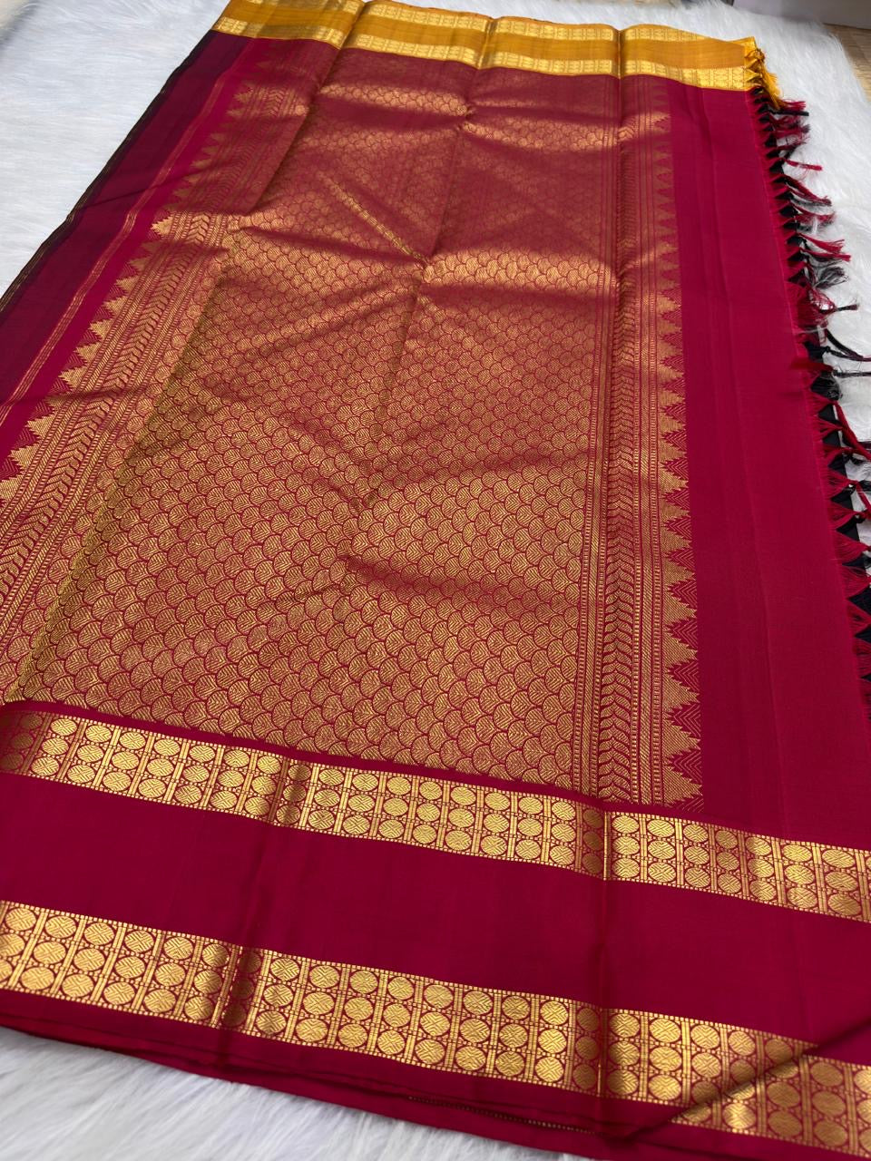 Multicolour Mayil Chakram buttas on black Kanjeevaram Rettapet silk saree - Idam Living