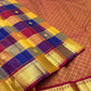 Multicolour pure silk Kanjivaram Paalum Pazhamum saree with blue purple mustard and rust woven checks.