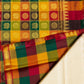 Multicolour Paalum Pazhamum pallu with mustard green maroon and orange silk checks.