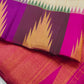 Warm Ivory pure mulberry silk saree with fine gold check pattern and rich multicolour Kanchipuram border.