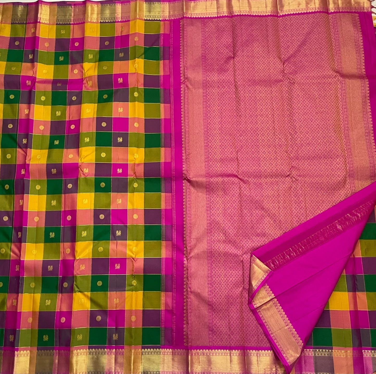 Multicoloured pure silk Kanchipuram saree with gold zari border, close-up