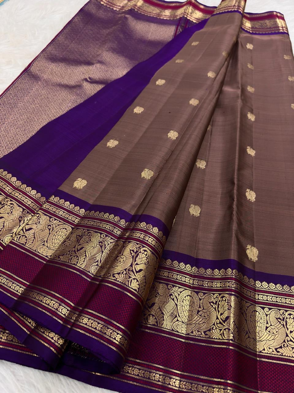 Mushroom Taupe pure silk Kanchipuram Varisaipet saree with Deep Violet Mayil gold zari border.