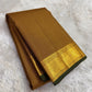 Close-up of mustard amber silk body showing near-tonal Zari Kattam gold grid on thick-ply mulberry silk