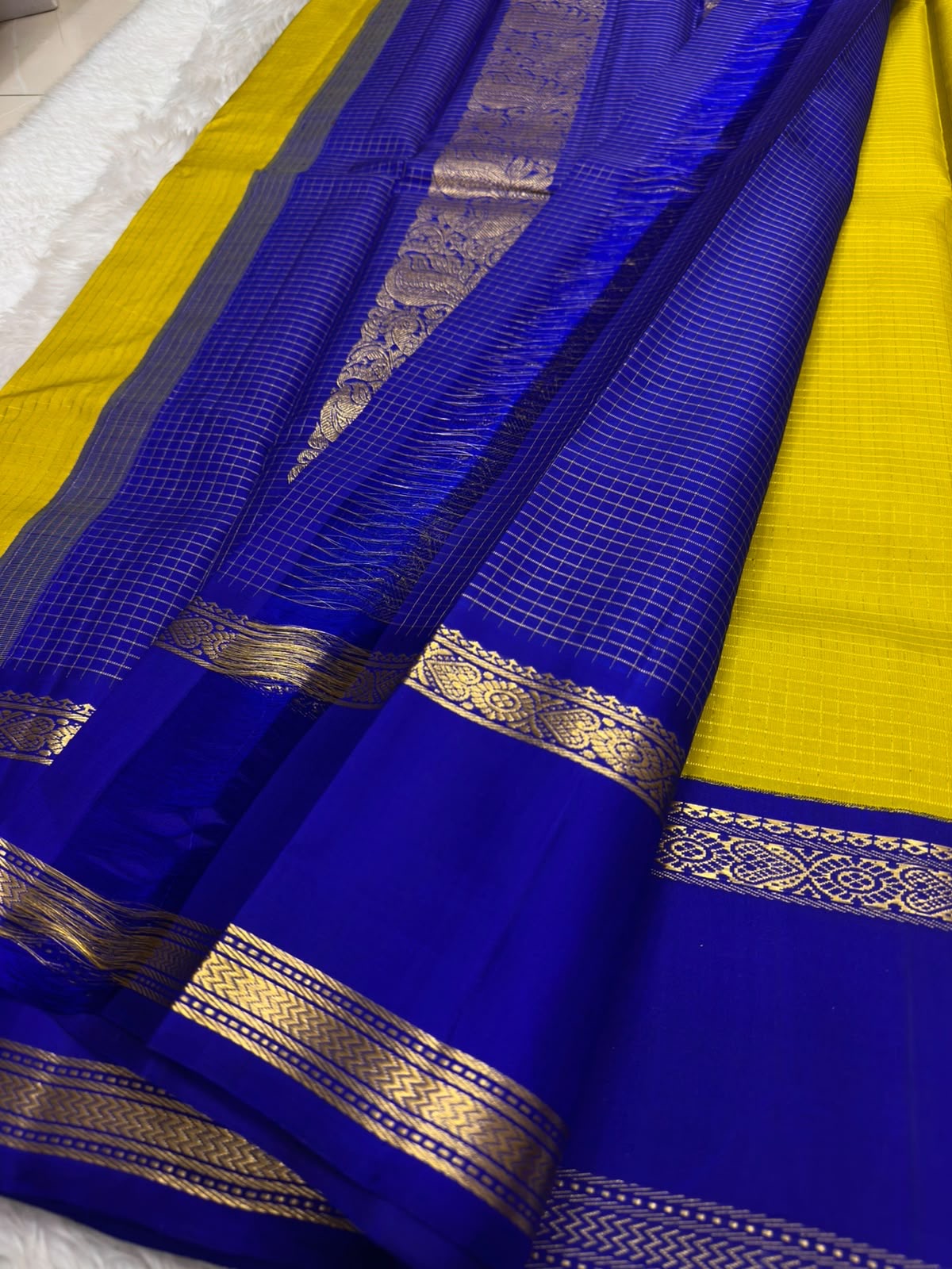 Full view of mustard and royal blue pure silk Kanchipuram saree with zari kattam body — Idam Living