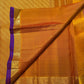 Handwoven Butta saree with traditional antique-gold zari border and Deep Purple selvedge.