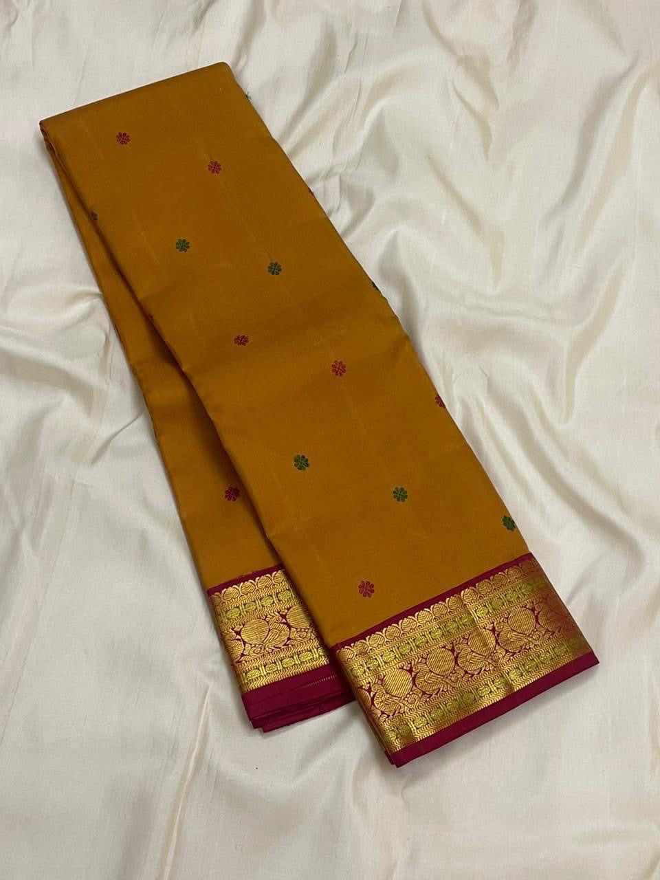 Raspberry pink Korvai border with peacock zari motifs, KanchiPattu silk saree