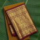 Mustard gold Kanchipuram silk saree with burgundy red korvai mayil border – front view