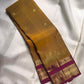 Handwoven Kanchipuram silk saree with antique gold zari wedding procession border